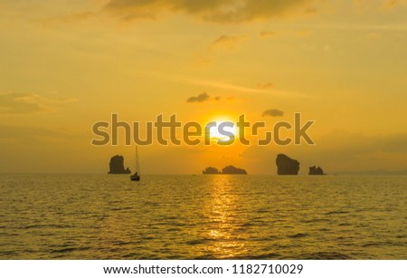 Beautiful blazing sunset landscape at black sea and orange sky in thailand.Amazing summer sunset view sea landscape.