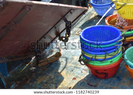 Old Fishing Boat on the Harbor and fishing net and Anchor and rope