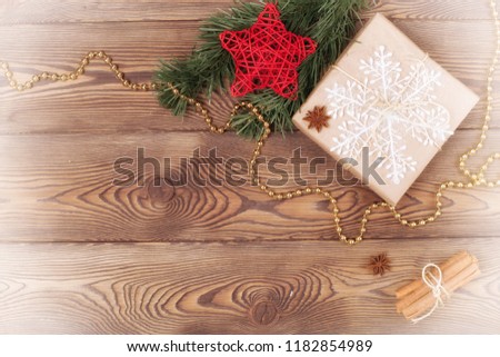 Christmas and New Year holiday background. Christmas decor on a wooden table. Top view, copy space