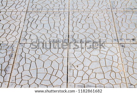 Sidewalk tiles are large
