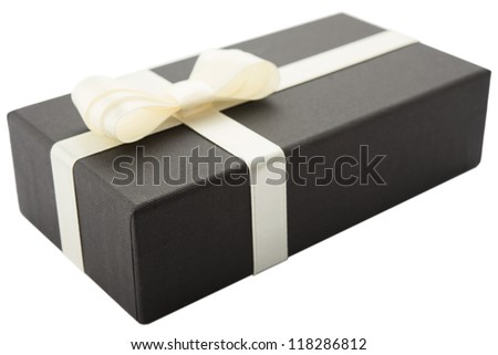 Black gift box with white bow, isolated on white background
