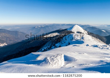 Snow covered winter mountains. Arctic landscape. Colorful outdoor scene, Artistic style post processed photo.