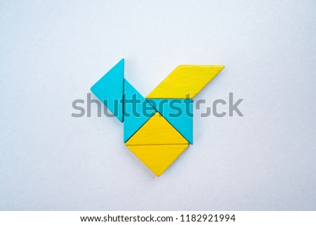 Tangram puzzle bird shape use for education and creative concept