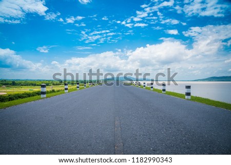 A long the way of road near Pha sak Chon la sith dams with blue cloudy sky background