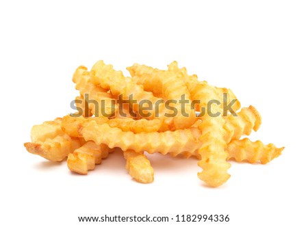 Crinkle Fries Isolated on a White Background Royalty-Free Stock Photo #1182994336