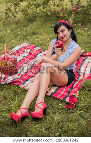 Autumn mood, cozy moments. Lifestyle of young woman. Cold weather and warm clothes.  Photo shows coziness mood, relax, tranquillity. Seasonal nature, picnic. Bright yellow leaves