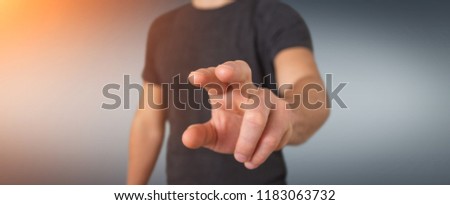 Businessman pointing finger on blurred background 