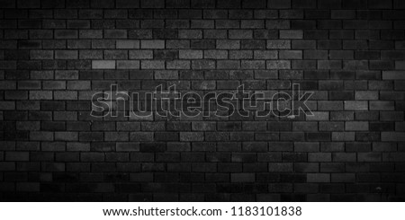 Black wall background The surface of the brick dark jagged. Abstract black wall background Royalty-Free Stock Photo #1183101838