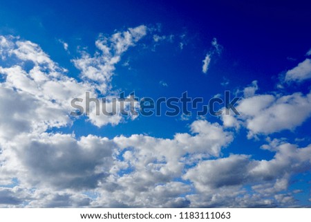Dramatic sky background. Clouds in the sky. High contrast photo. 