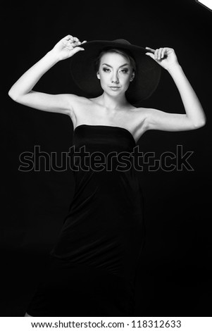  image of a beautiful model wearing black hat