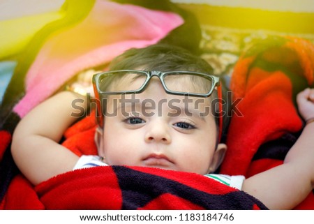 Indian baby girl on spectacles