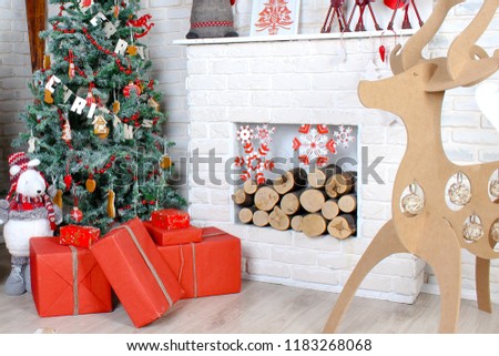 Christmas background with a Christmas tree and gifts on the background of a fireplace. Merry Christmas card. Winter holiday theme. Happy New Year. Happy Holidays
 Royalty-Free Stock Photo #1183268068