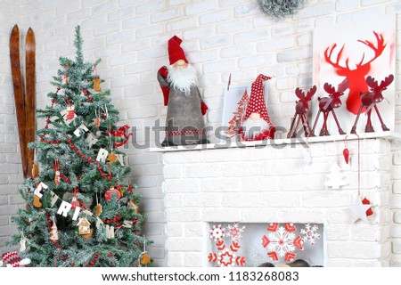 Christmas background with a Christmas tree and gifts on the background of a fireplace. Merry Christmas card. Winter holiday theme. Happy New Year. Happy Holidays
 Royalty-Free Stock Photo #1183268083