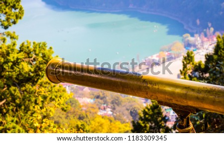 Telescope present on the Naini Lake view point in Nainital, Uttarakhand, India, Asia. The device is used to see distant Shikara rides and local monuments viewable from the view point.
