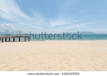 Beautiful beach with white sand, blue sea, blue sky, pictures used in the design, printing, advertising, marketing for travel and beautiful, paradise of the sea