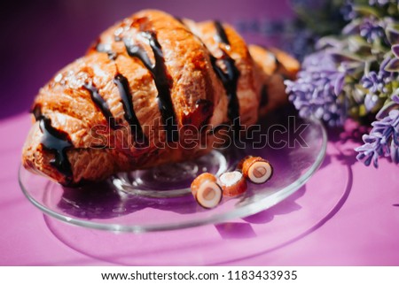 croissant with chocolate. Tasty buttery croissant. Breakfast with croissant, coffee