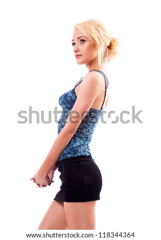 Studio portrait of a young blond woman isolated on white background
