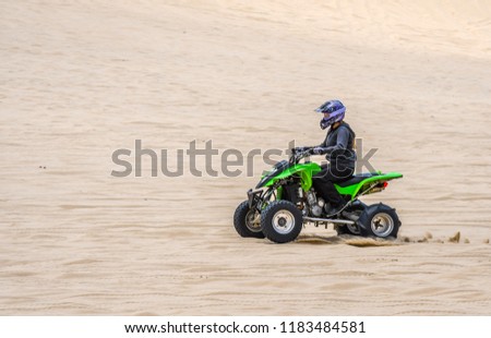 Oregon Dunes National Recreation Area-Oregon State, June 03 2017 : Off Road Vehicle driving over the Oregon Sand Dunes in late afternoon, USA