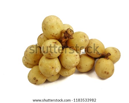 Ripe lanzones fruit on isolated white background. Langsat or Lanzones fruit is endemic to Southeast Asia. watery flesh with a sweet flavor and refreshing, but some variety are sour.