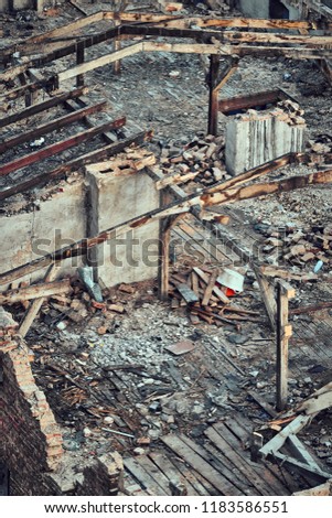 Color toned picture of a destroyed building, disaster concept.