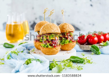 fresh delicious burgers in Form of Football (soccer)