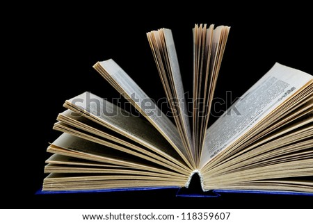 open book isolated on white background - close-up