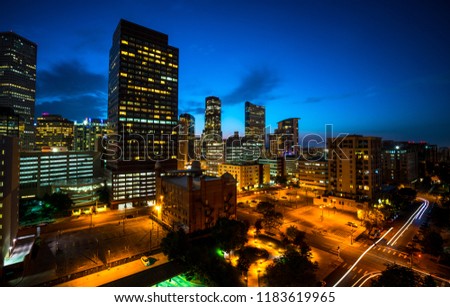 Night City Glow of Denver , Colorado , USA Nightscape long exposure Skyline CItyscape at Blue Hour overlooking the City at night