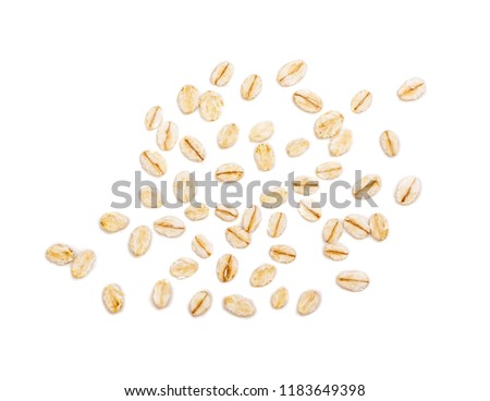 Dry Raw Oat Flakes Isolated on White Background. Rolled Flat Grains of Wheat, Bran, Barley, Rye Cereals for Muesli or Granola Royalty-Free Stock Photo #1183649398