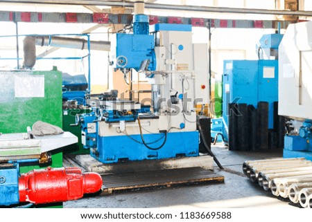 Industrial iron lathe for cutting, turning of billets from metals, wood and other materials, turning, manufacturing of details and spare parts at the factory.