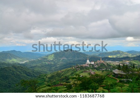 The landscape around Wat Phra That Pha Sorn Kaew. There is a large white Buddha statue that stands out as a highly popular temple of Khao Kho District, Phetchabun Province, Thailand.
