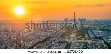 paris streets with view on the famous paris eiffel tower on a sunny day with sunshine Royalty-Free Stock Photo #1183728430