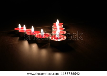 close-up of romantic red candles