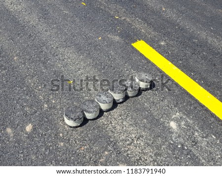 Asphalt sample with pair of yellow line.background and texture. Soft focus,Select focus