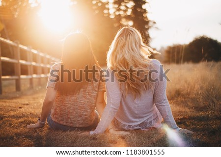 Girls watching sunset