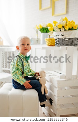 little boy celebrates Easter