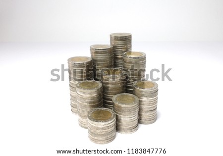 Business growth concept,Increasing piles of coins, Financial growth,Budget planning,Coins background 