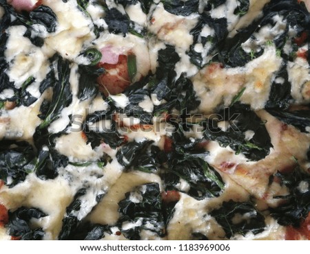 Hot pizza with spinach