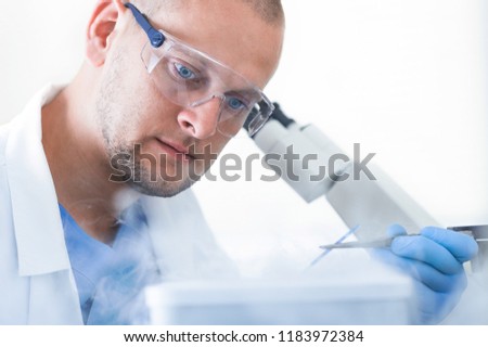 Scientist with equipment and science experiments