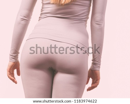 Clothing fashion sport concept. Part body picture with thermoactive underwear. Attractive fit woman promoting sporty clothes.