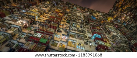 Overcrowded residential building in Hong Kong Royalty-Free Stock Photo #1183991068
