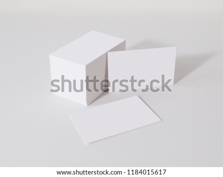 Mockup of business cards at white textured background.