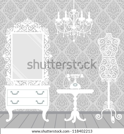 Women's room in vintage, boudoir style with mannequin, chandelier, mirror, table and telephone