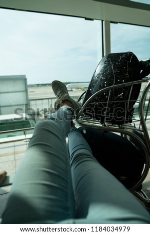 Woman waiting for her plane to leave