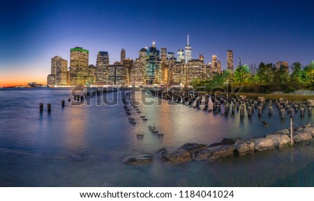 Panorama of Lower Manhattan with the East River in the foreground