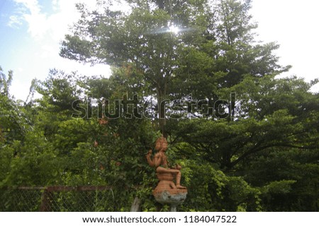 Thai Buddhist statue decoration in a garden in Mae Hong Son, Northern Thailand