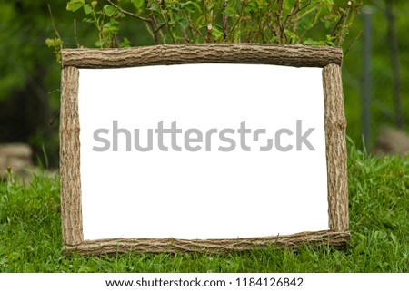 wooden frame with white space in nature