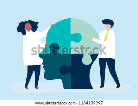 People connecting jigsaw pieces of a head together Royalty-Free Stock Photo #1184139997