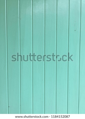 texture background of painted wood in blue and cream color