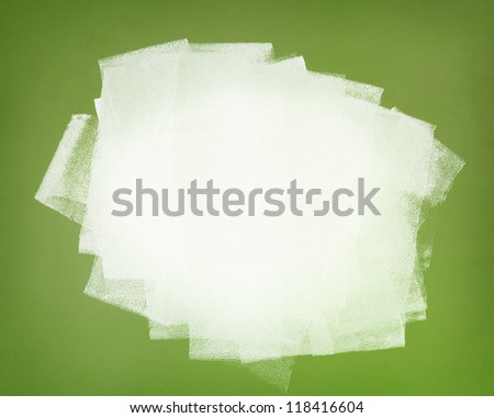 Brushstrokes of white paint covering the green wall. Abstract background. Royalty-Free Stock Photo #118416604