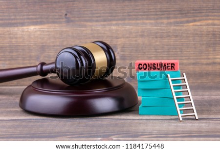 consumer protection, justice and law concept. colorful Wooden Blocks